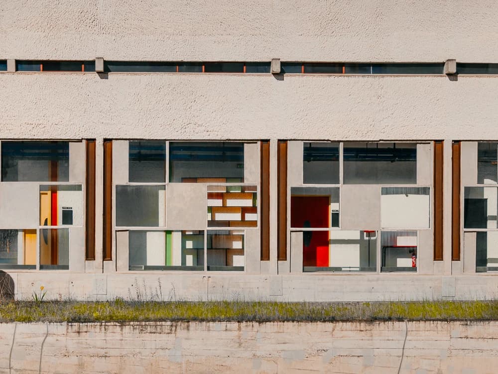 Concrete walls, glazing and coloured panels at La Tourette.
