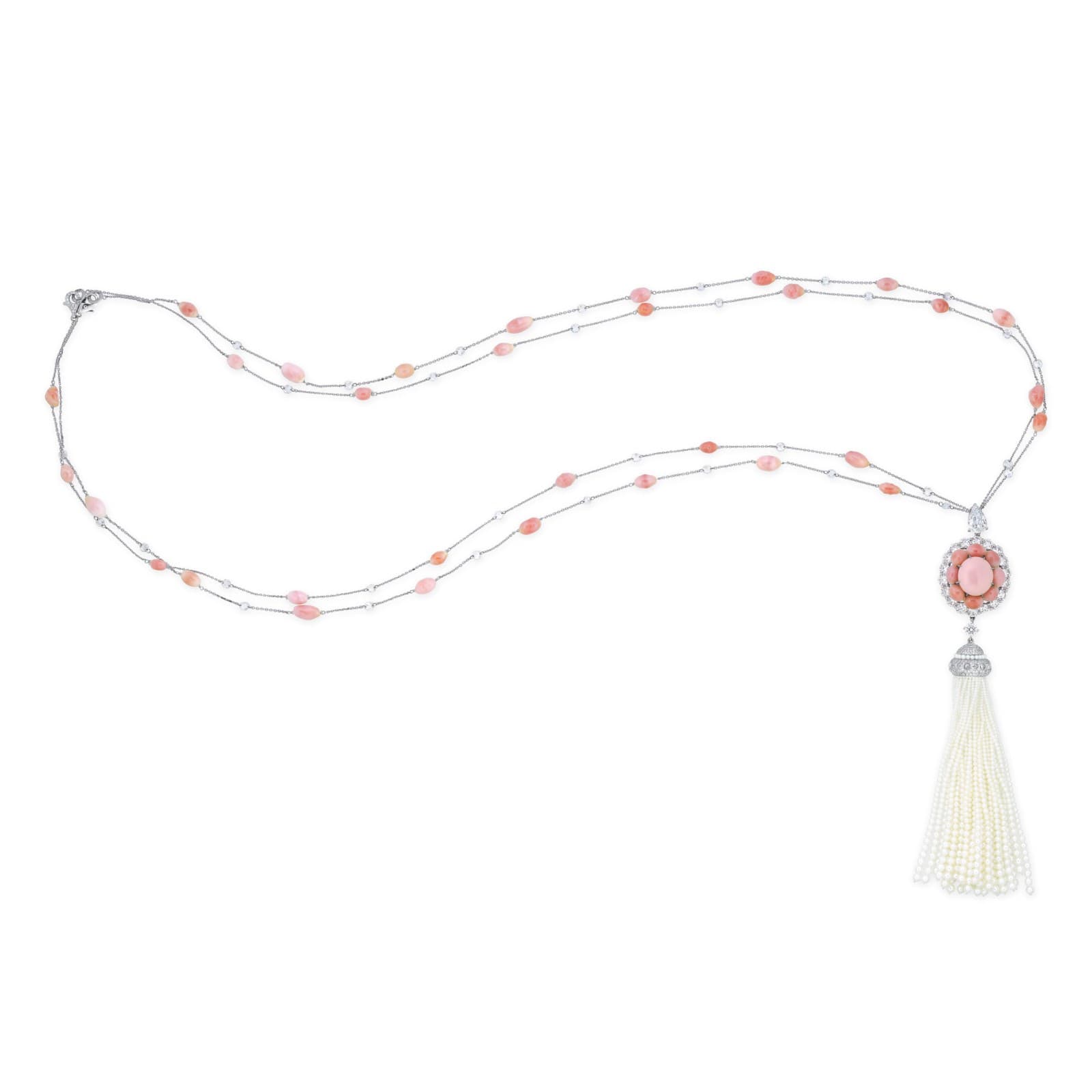A long conch pearl, diamond and seed pearl necklace arranged on a white background.