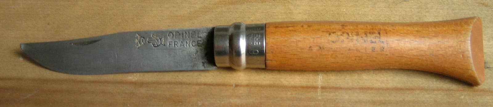 The complete used Opinel No.6, with its blade and wooden handle shown without cropping.
