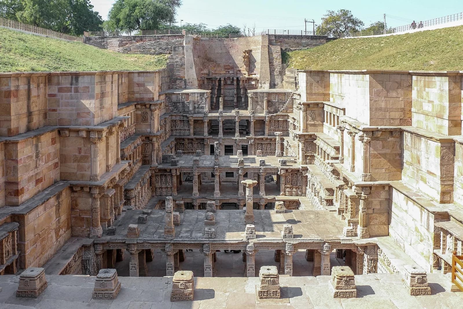 A descending view into the carved stone levels, platforms and stairways of Rani-ki-Vav at Patan.