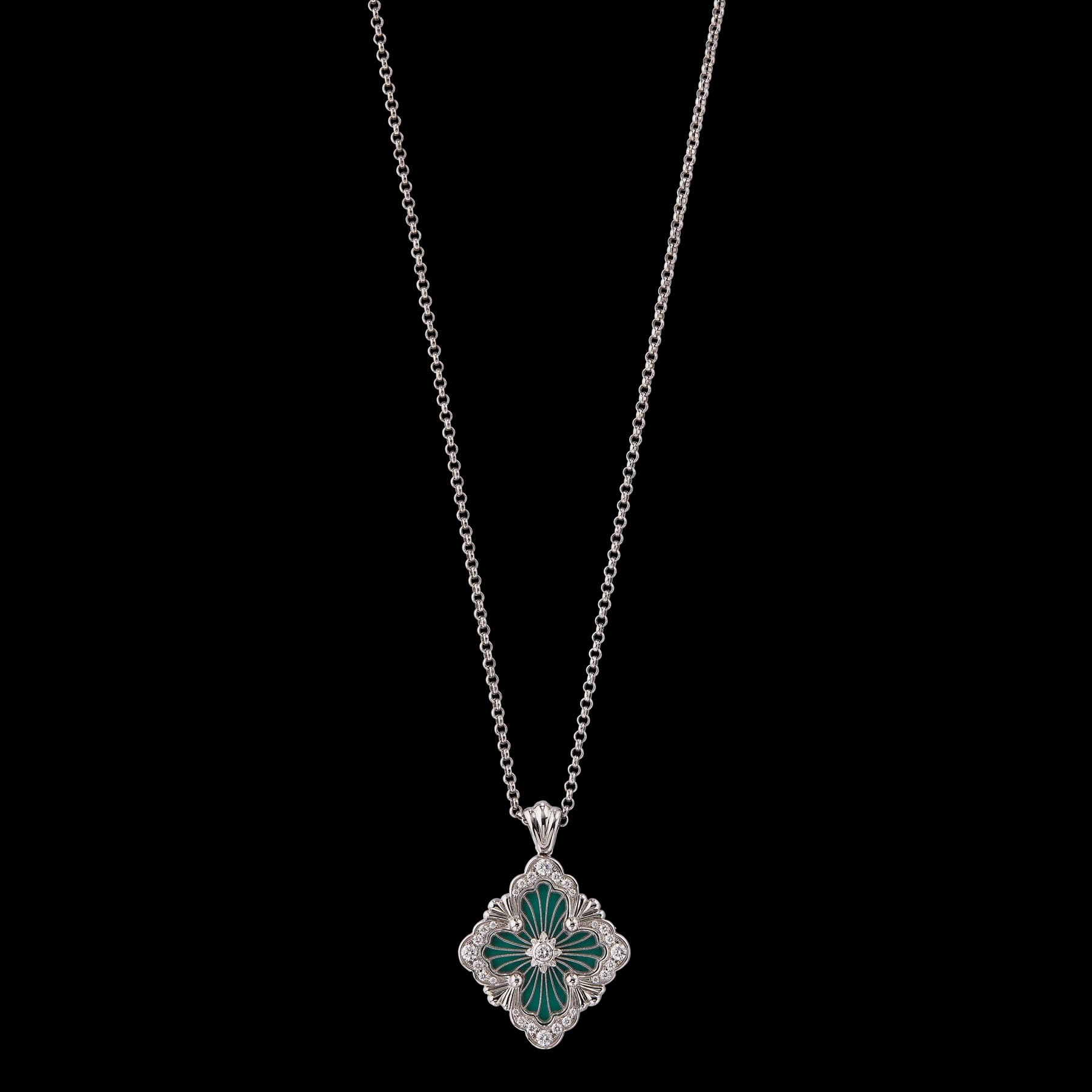 A Buccellati Opera Tulle pendant suspended from a pale chain, with green chrysoprase, fine radial platinum work and diamond accents.