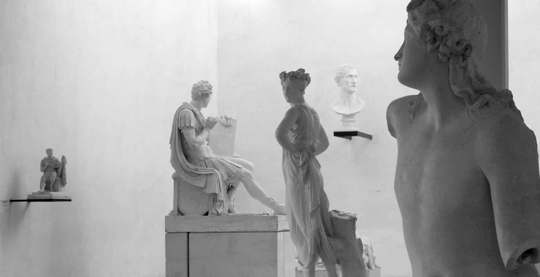 Pale plaster figures occupy a luminous white gallery in Carlo Scarpa’s extension to the Canova Gypsotheca in Possagno.