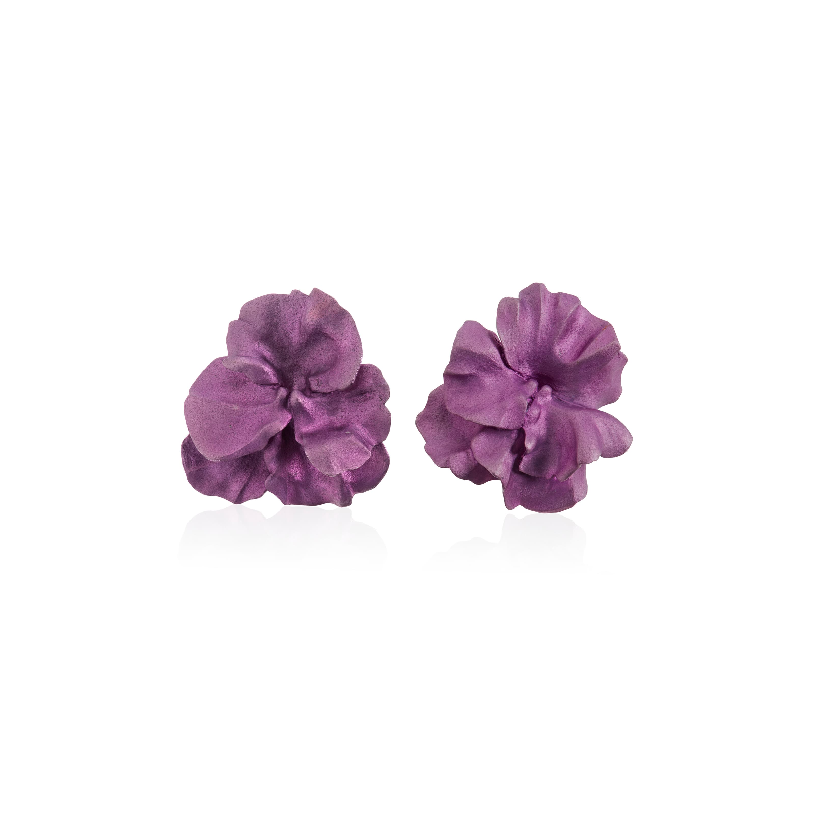 A pair of sculpted purple JAR aluminium flower earrings photographed against a white background.