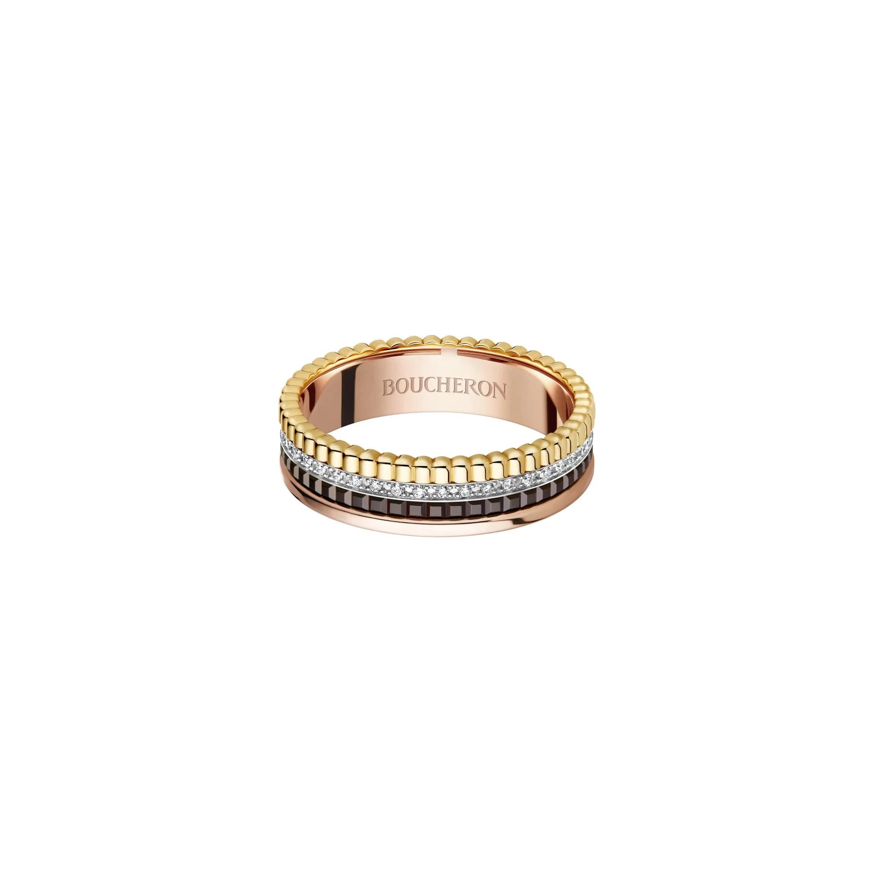 A complete Boucheron Quatre Classique extra-small diamond ring on white, showing yellow and pink gold, diamonds and the brown patterned PVD band.
