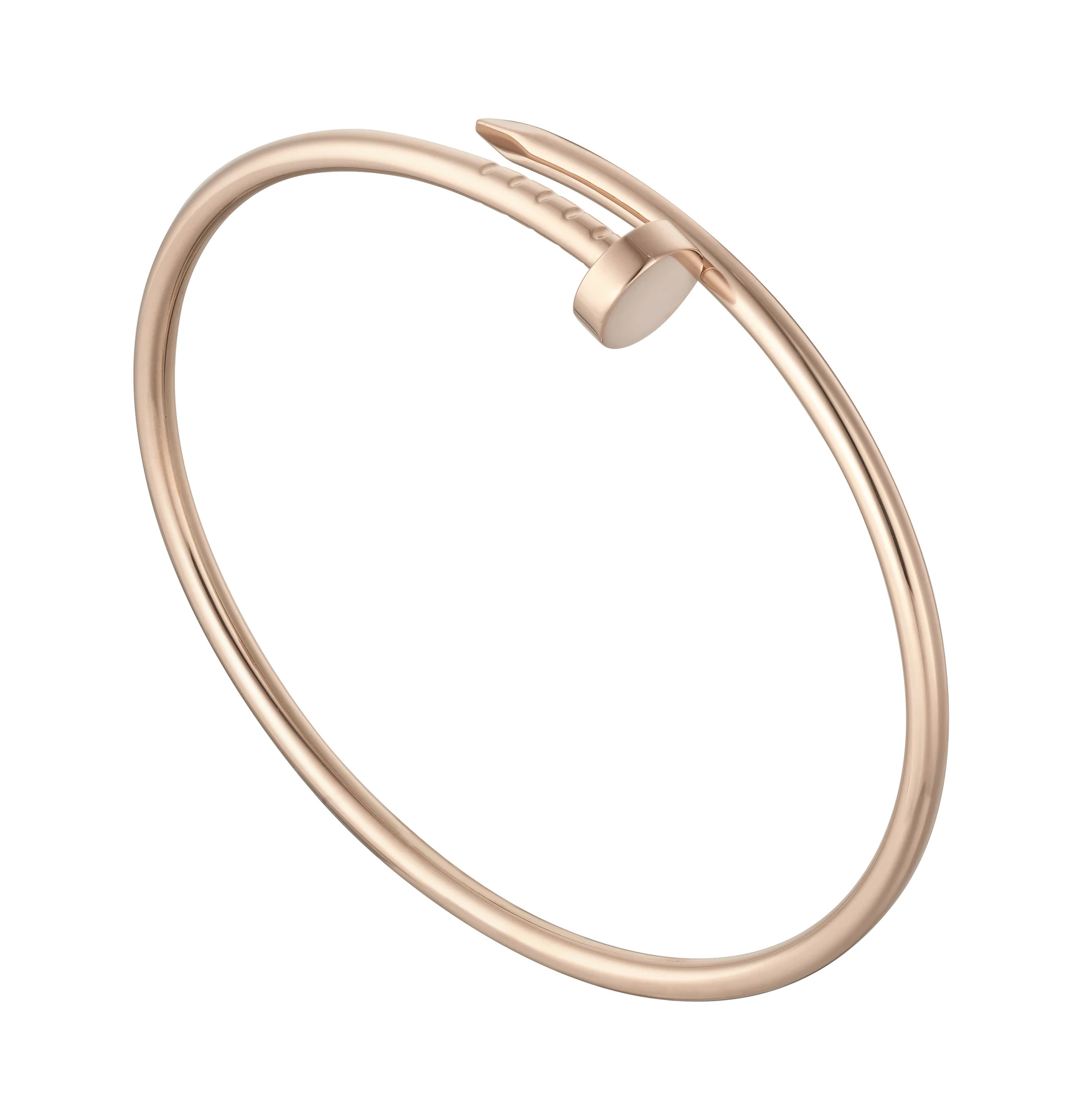 A slim pink-gold Cartier Juste un Clou bracelet shown on white, with a nail head and pointed end overlapping along the curved band.