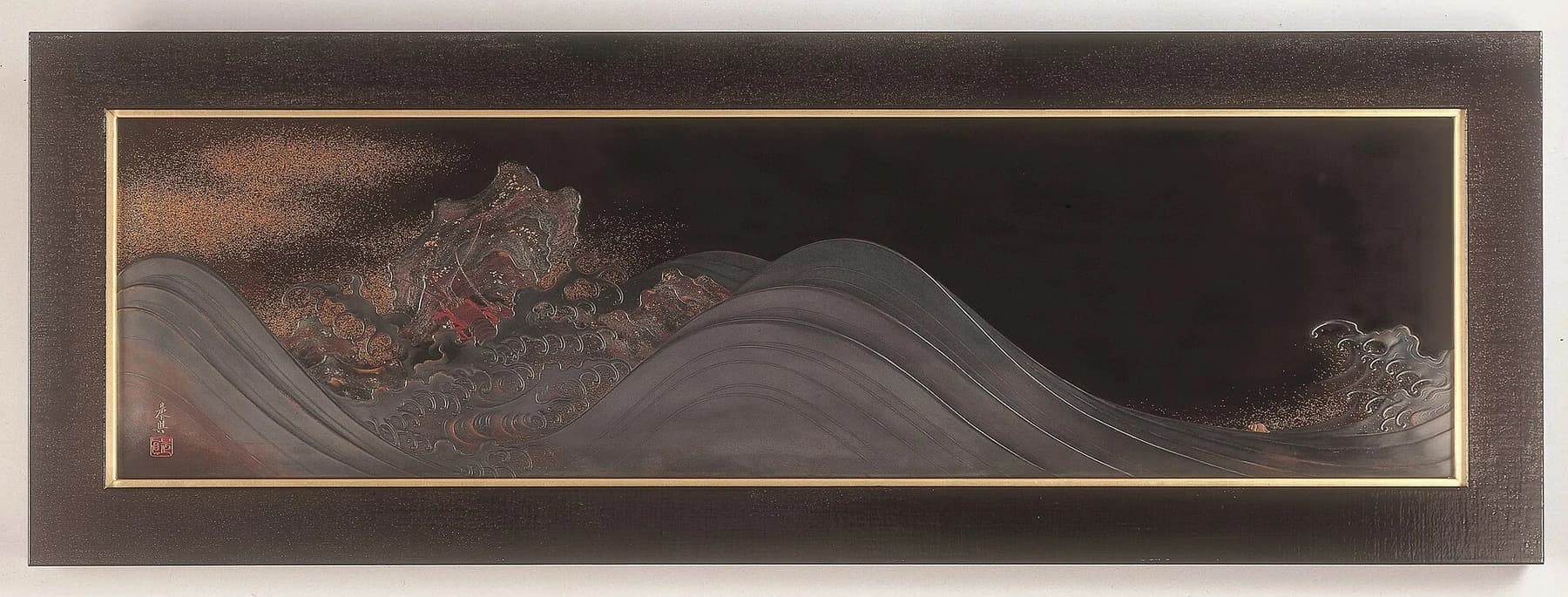 Shibata Zeshin’s wide framed lacquer panel depicting breaking waves against dark rocks, shown in full with its border and small crustacean details.