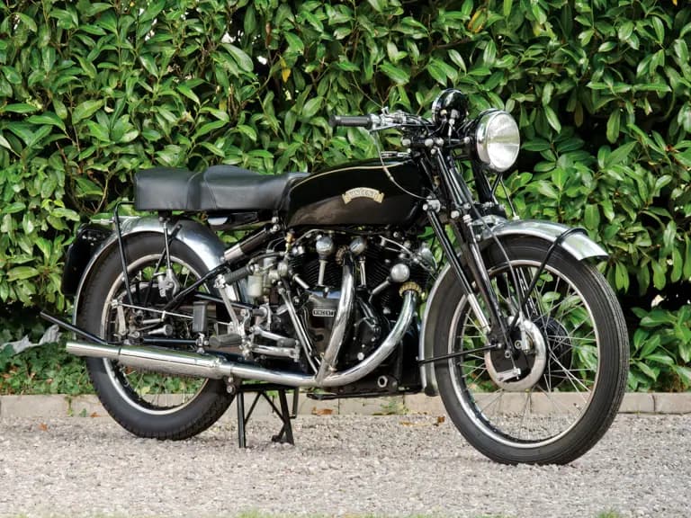 A black 1952 Vincent Series C Black Shadow motorcycle photographed outdoors from the left side.
